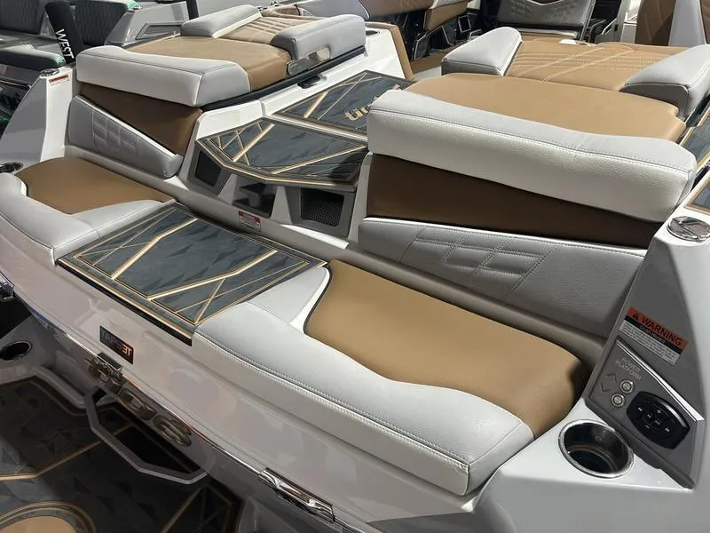 Slide: The Image of 2025 Tigé Ultré 23ZX boat interior with luxurious seating and modern design. - 1