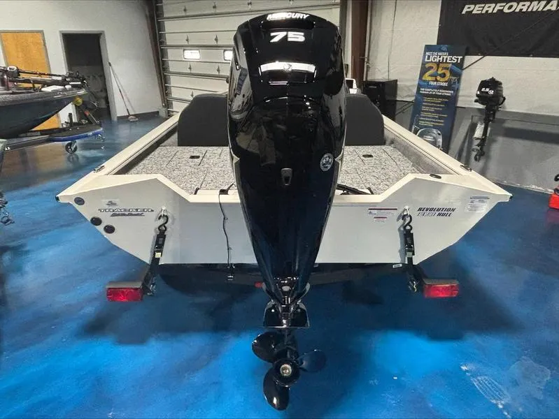 Slide: The Image of 2025 Tracker PT 175 TXW boat with Mercury 75 engine in showroom. - 4