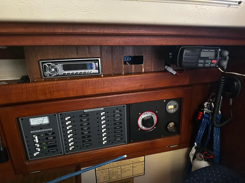 Slide: The Image of Control panel of a 1984 Catalina 36 Tall Rig sailboat with radio and gauges. - 12