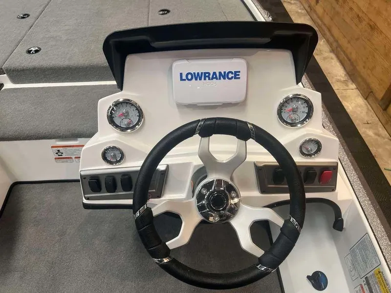 Slide: The Image of Steering console of 2025 Nitro Z18 boat with Lowrance electronics and gauges. - 4