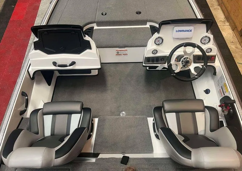 Slide: The Image of Interior of a 2025 Nitro Z18 boat with dual seats and steering console. - 5