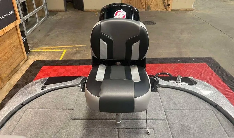 Slide: The Image of 2025 Nitro Z18 boat seat in a showroom, featuring sleek black and gray design. - 8