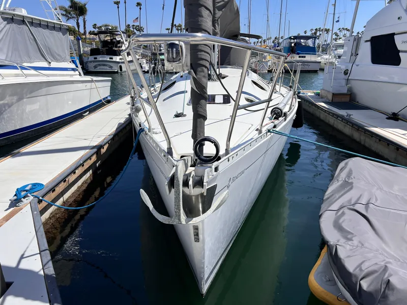 Slide: The Image of Beneteau First 41s5 sailboat docked in marina, 1990 model, front view. - 11