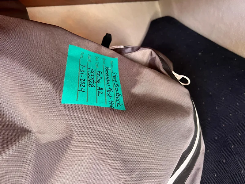 Slide: The Image of Bag with a turquoise label on a Beneteau First 41s5 sailboat, 1990 model. - 48