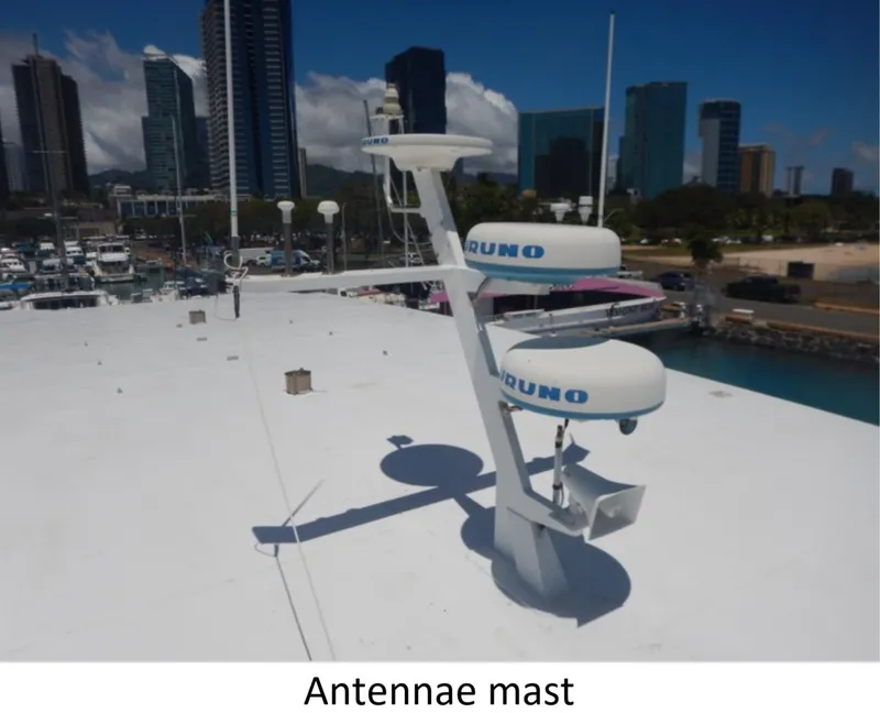 Slide: The Image of Antenna mast on 2010 Custom Semi Sub Power Catamaran with city skyline background. - 5