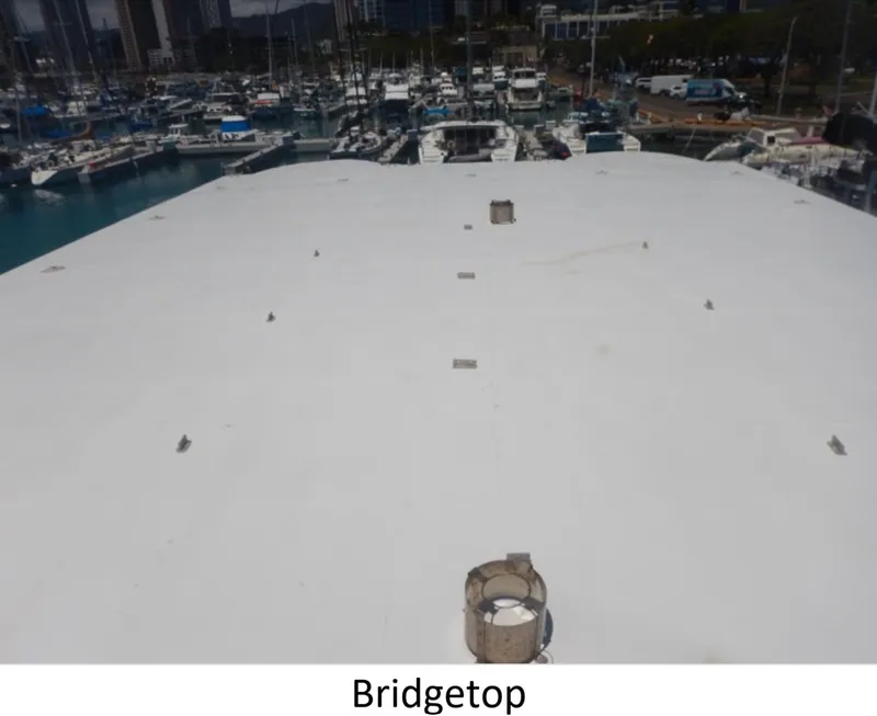 Slide: The Image of Bridgetop view of 2010 Custom Semi Sub Power Catamaran in marina setting. - 6