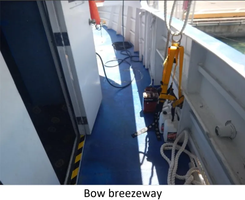 Slide: The Image of Bow breezeway of 2010 Custom Semi Sub Power Catamaran with ropes and equipment. - 8