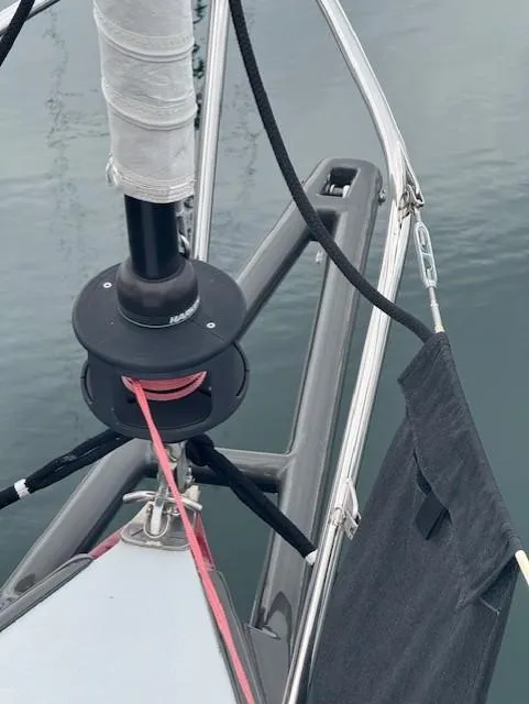 Slide: The Image of Close-up of a 1985 Farr PERFORMANCE sailboat's bow with rigging and ropes. - 10