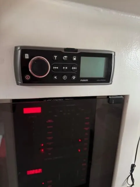 Slide: The Image of Control panel with digital display on a 1985 Farr PERFORMANCE boat. - 19