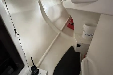 Slide: The Image of Interior of 1985 Farr PERFORMANCE sailboat with radio and storage compartments. - 28