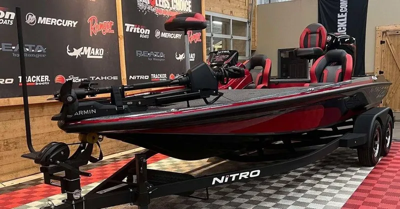 Slide: The Image of 2025 Nitro Z20 XL Pro bass boat in showroom, featuring sleek design and advanced equipment. - 5