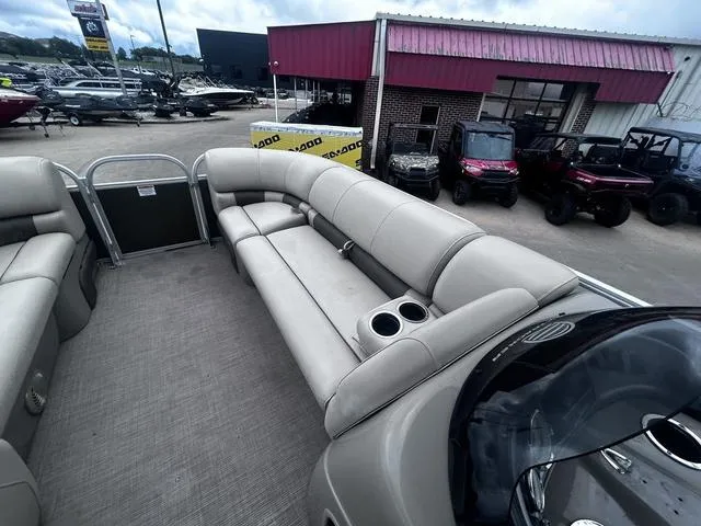 Slide: The Image of 2022 Sun Tracker PARTY BARGE® 20 DLX pontoon boat with spacious seating and cup holders. - 19