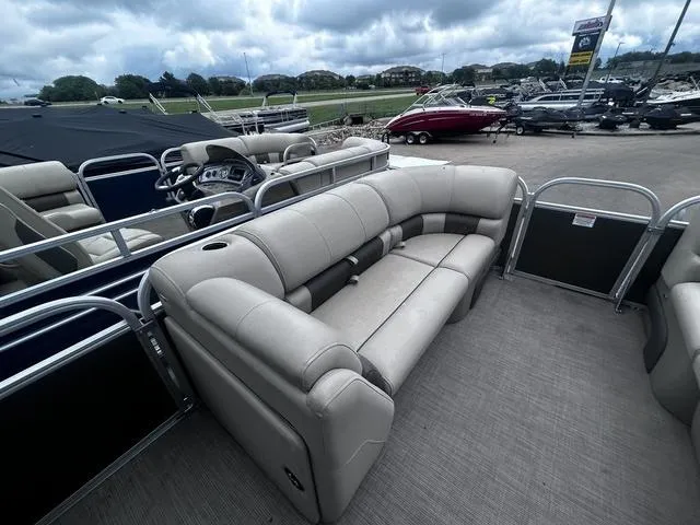 Slide: The Image of 2022 Sun Tracker PARTY BARGE® 20 DLX pontoon boat with spacious seating and modern design. - 20