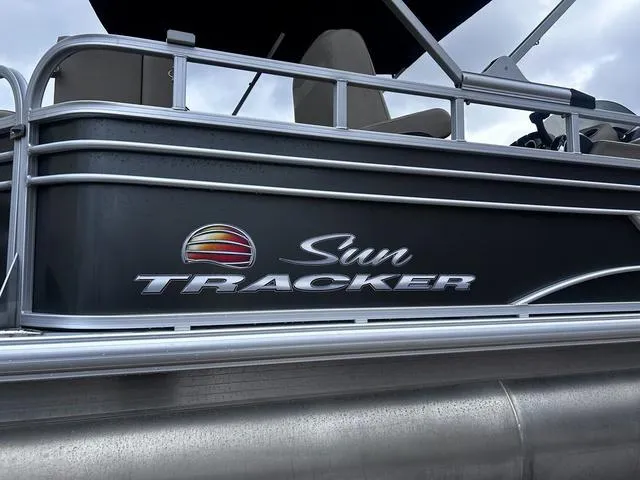 Slide: The Image of 2022 Sun Tracker PARTY BARGE® 20 DLX pontoon boat side view with logo. - 4