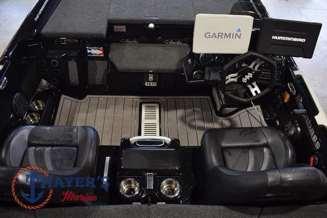 Slide: The Image of 2023 Bass Cat Puma STS boat interior with Garmin and Humminbird electronics. - 19