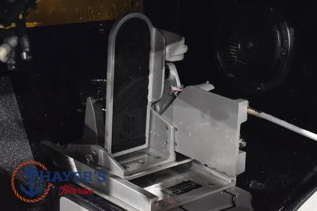 Slide: The Image of 2023 Bass Cat Puma STS boat pedal mechanism, detailed view with branding. - 22