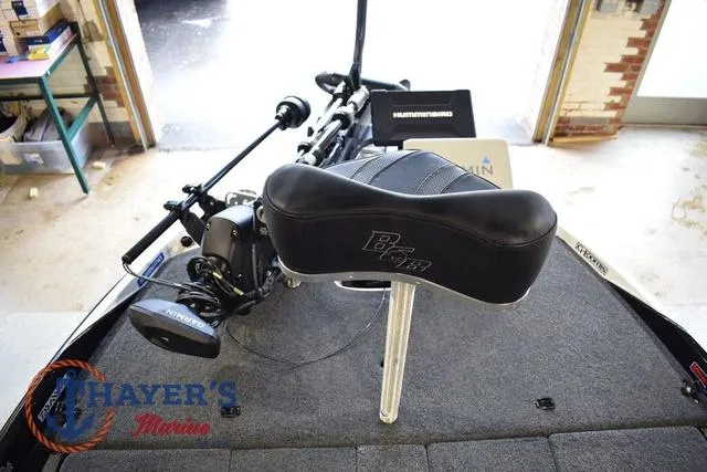 Slide: The Image of 2023 Bass Cat Puma STS boat interior with seat and fishing equipment. - 36