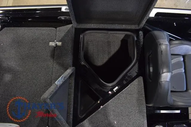 Slide: The Image of 2023 Bass Cat Puma STS boat interior storage compartments and seating. - 46