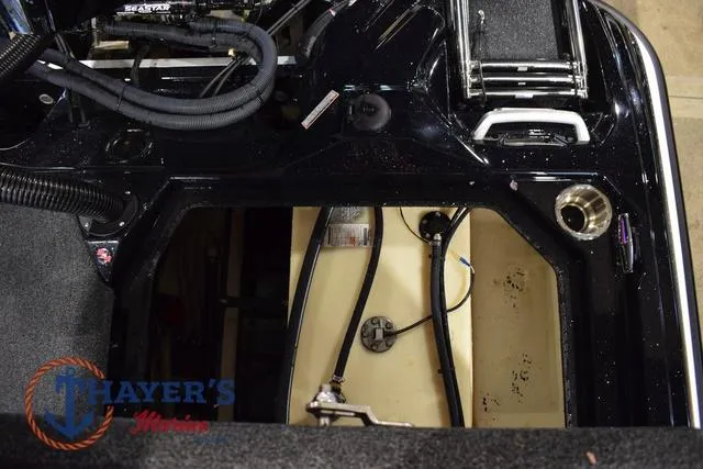 Slide: The Image of 2023 Bass Cat Puma STS boat interior showing storage and wiring details. - 47