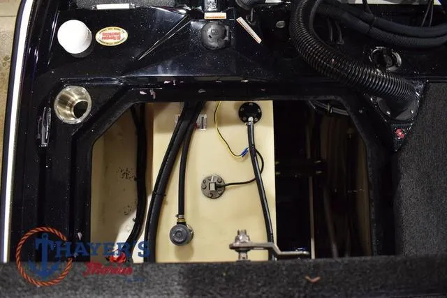 Slide: The Image of 2023 Bass Cat Puma STS boat interior showing wiring and components. - 48