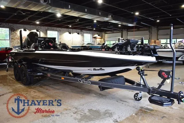 Slide: The Image of 2023 Bass Cat Puma STS boat on trailer at Thayer's Marine showroom. - 5