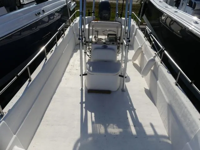 Slide: The Image of 2012 Carolina Skiff DLV Series 258 boat interior with center console and seating. - 13