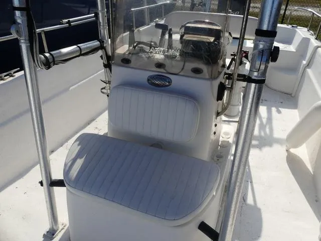 Slide: The Image of 2012 Carolina Skiff DLV Series 258 boat interior with console and seating. - 15