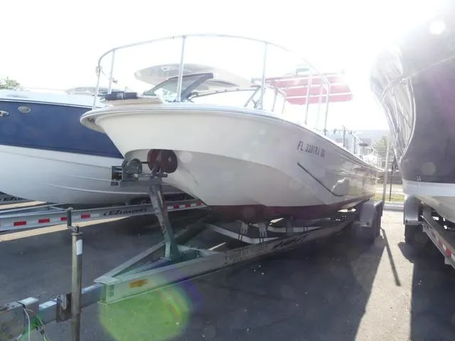 Slide: The Image of 2012 Carolina Skiff DLV Series 258 boat on trailer, parked outdoors. - 3