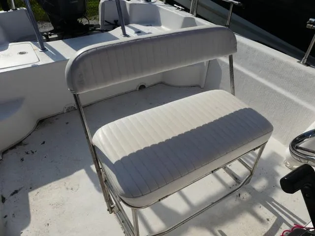 Slide: The Image of White bench seat on a 2012 Carolina Skiff DLV Series 258 boat. - 9