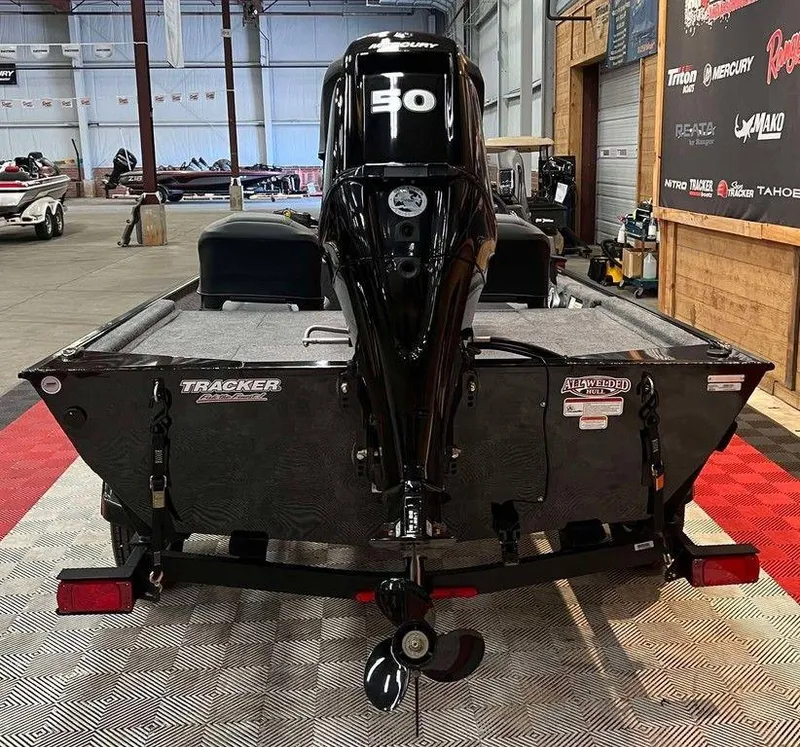 Slide: The Image of 2025 Tracker BASS TRACKER® Classic XL boat with 50 HP engine in showroom. - 3