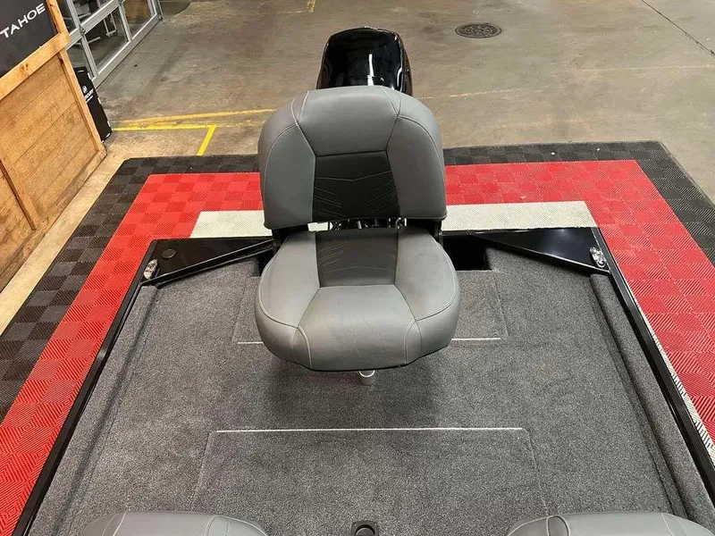 Slide: The Image of 2025 Tracker BASS TRACKER® Classic XL boat seat on carpeted deck. - 7