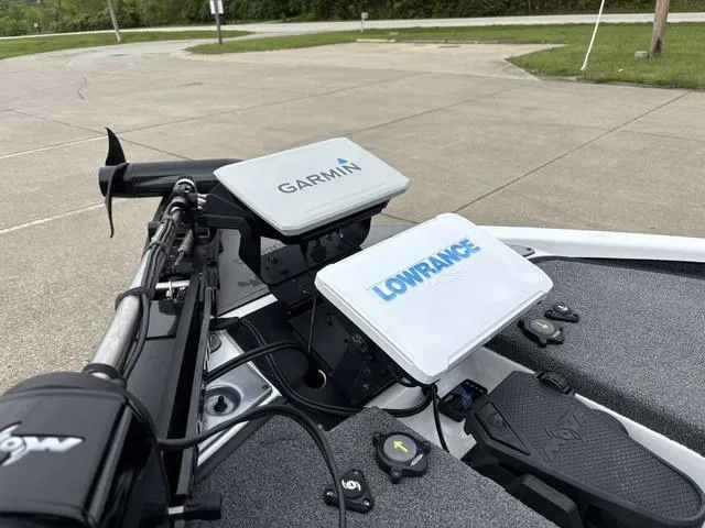 Slide: The Image of Dual Garmin and Lowrance fish finders on a 2020 Phoenix 920 Elite boat. - 14