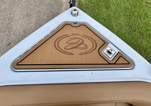 Slide: The Image of 2025 Cobalt R6 Surf boat deck with logo and sleek design. - 11