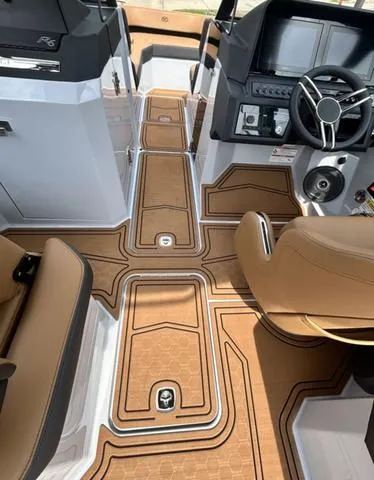 Slide: The Image of 2025 Cobalt R6 Surf boat interior with sleek design and modern dashboard. - 29