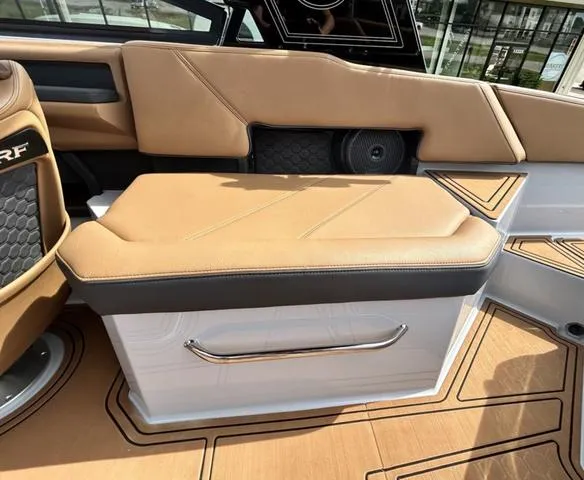 Slide: The Image of 2025 Cobalt R6 Surf boat interior with tan leather seating and modern design. - 41