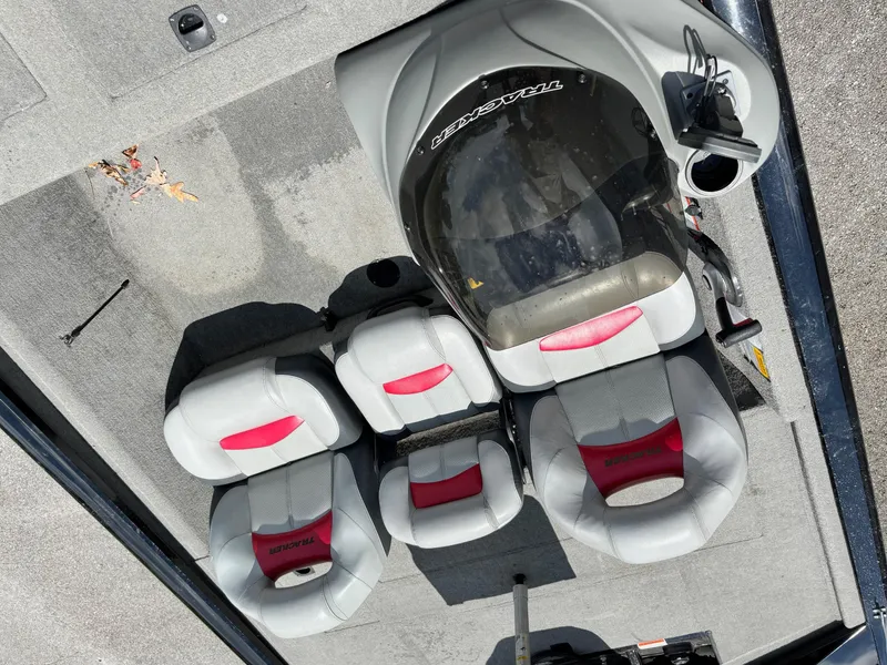 Slide: The Image of 2012 Bass Tracker PRO TEAM 190 boat interior with four seats and steering console. - 8