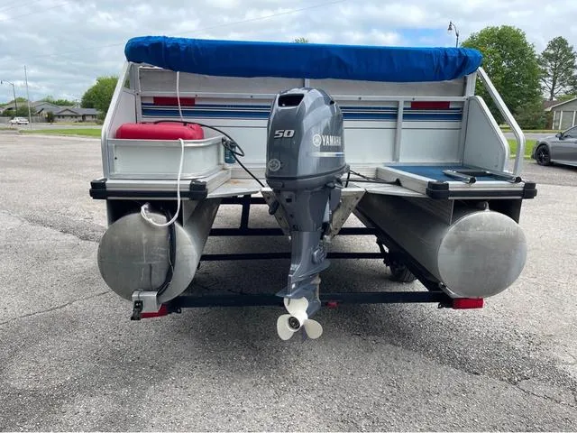 Slide: The Image of 1995 Sun Tracker BASS BUGGY 18 pontoon boat with Yamaha 50 outboard motor. - 5