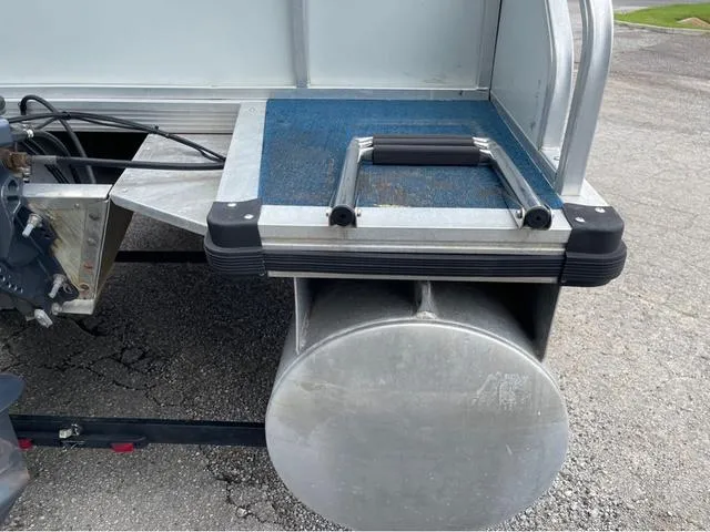 Slide: The Image of 1995 Sun Tracker BASS BUGGY 18 pontoon boat rear platform and ladder detail. - 6