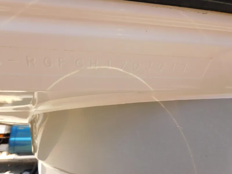 Slide: The Image of Close-up of a 2011 Monterey 260 SCR boat hull identification number. - 15