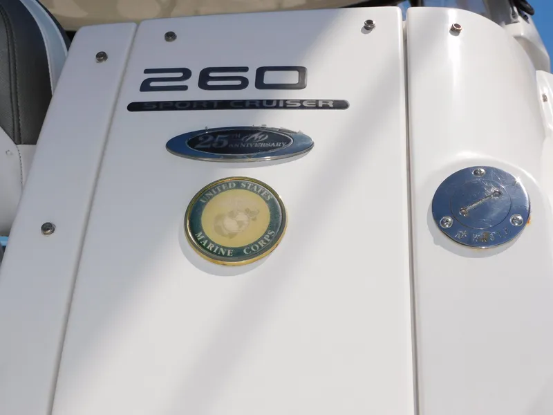 Slide: The Image of 2011 Monterey 260 SCR boat with Marine Corps emblem and 25th anniversary badge. - 17