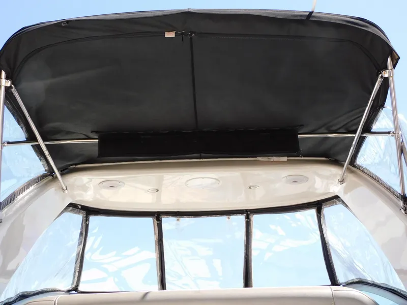 Slide: The Image of 2011 Monterey 260 SCR boat canopy and windshield, viewed from below. - 18