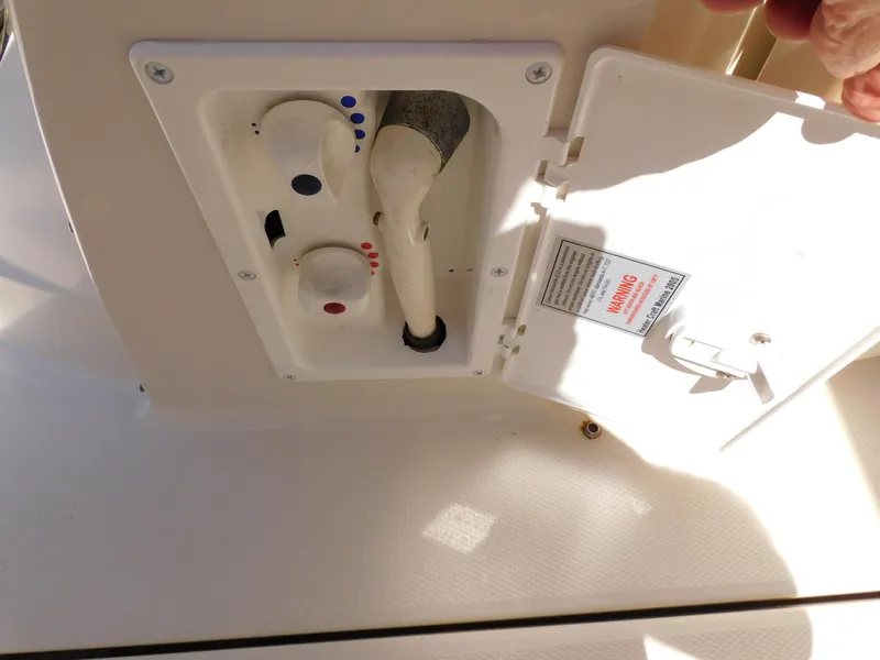 Slide: The Image of Control panel on a 2011 Monterey 260 SCR boat with open access door. - 36