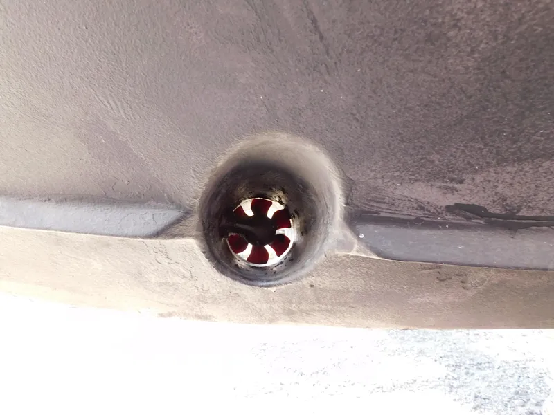 Slide: The Image of Close-up of a 2011 Monterey 260 SCR boat drain plug. - 4