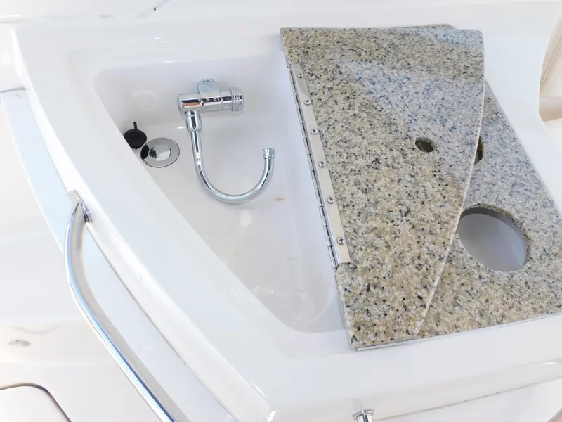 Slide: The Image of Granite countertop and sink on 2011 Monterey 260 SCR boat. - 40