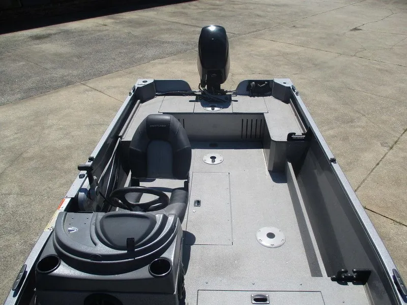 Slide: The Image of 2018 Crestliner 1450 Discovery Side Console boat, featuring spacious interior and modern design. - 4