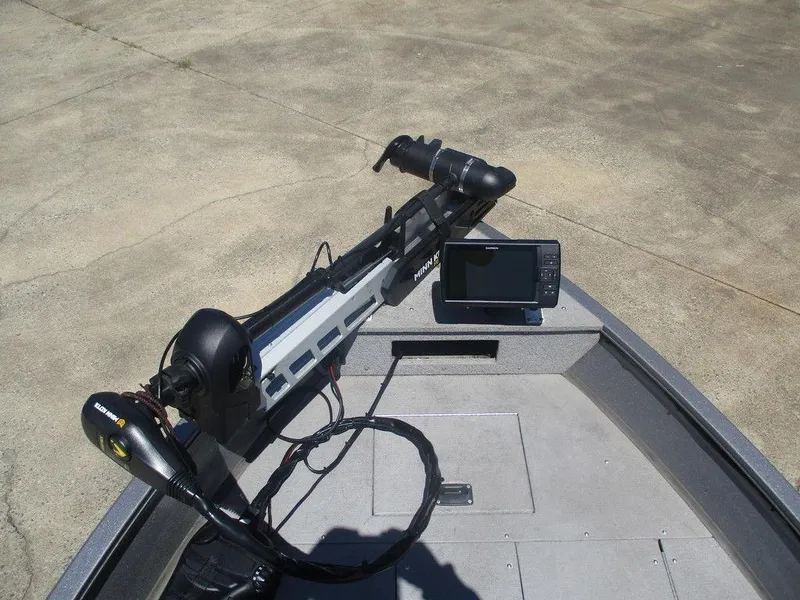 Slide: The Image of 2018 Crestliner 1450 Discovery Side Console with trolling motor and fish finder. - 5