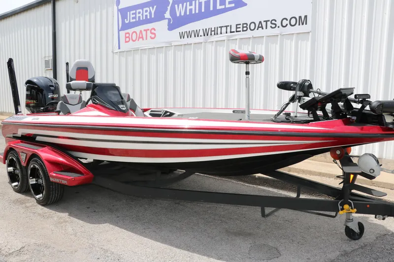 Slide: The Image of 2019 Skeeter FX20 bass boat in red and white, parked at Jerry Whittle Boats. - 11