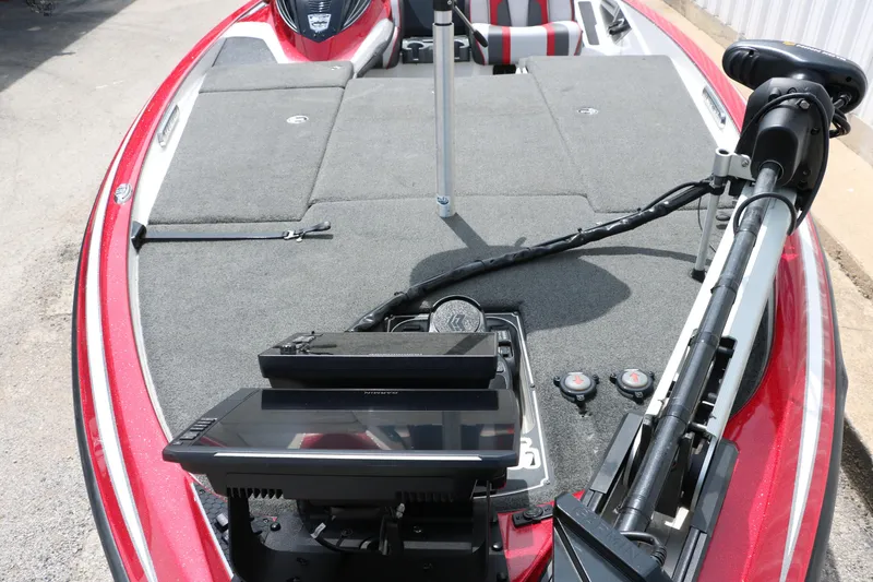 Slide: The Image of 2019 Skeeter FX20 boat deck with advanced navigation equipment and red accents. - 13
