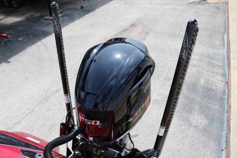 Slide: The Image of 2019 Skeeter FX20 boat engine with dual power poles on a concrete surface. - 17