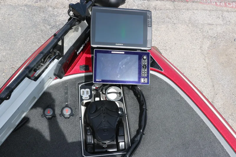 Slide: The Image of 2019 Skeeter FX20 boat dashboard with Garmin and Humminbird electronics. - 26